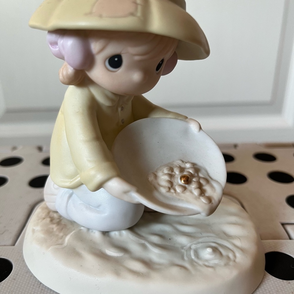 Precious Moments Yellow and White Figurine